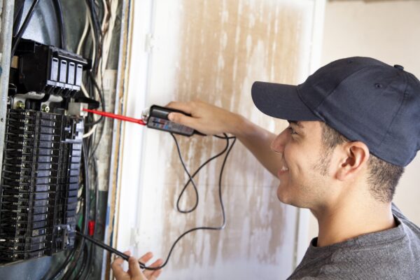 Electrician Working on Electrical Breaker in Ambler, PA